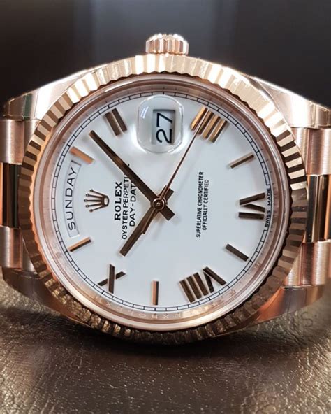 rolex day date 40 rose gold white dial